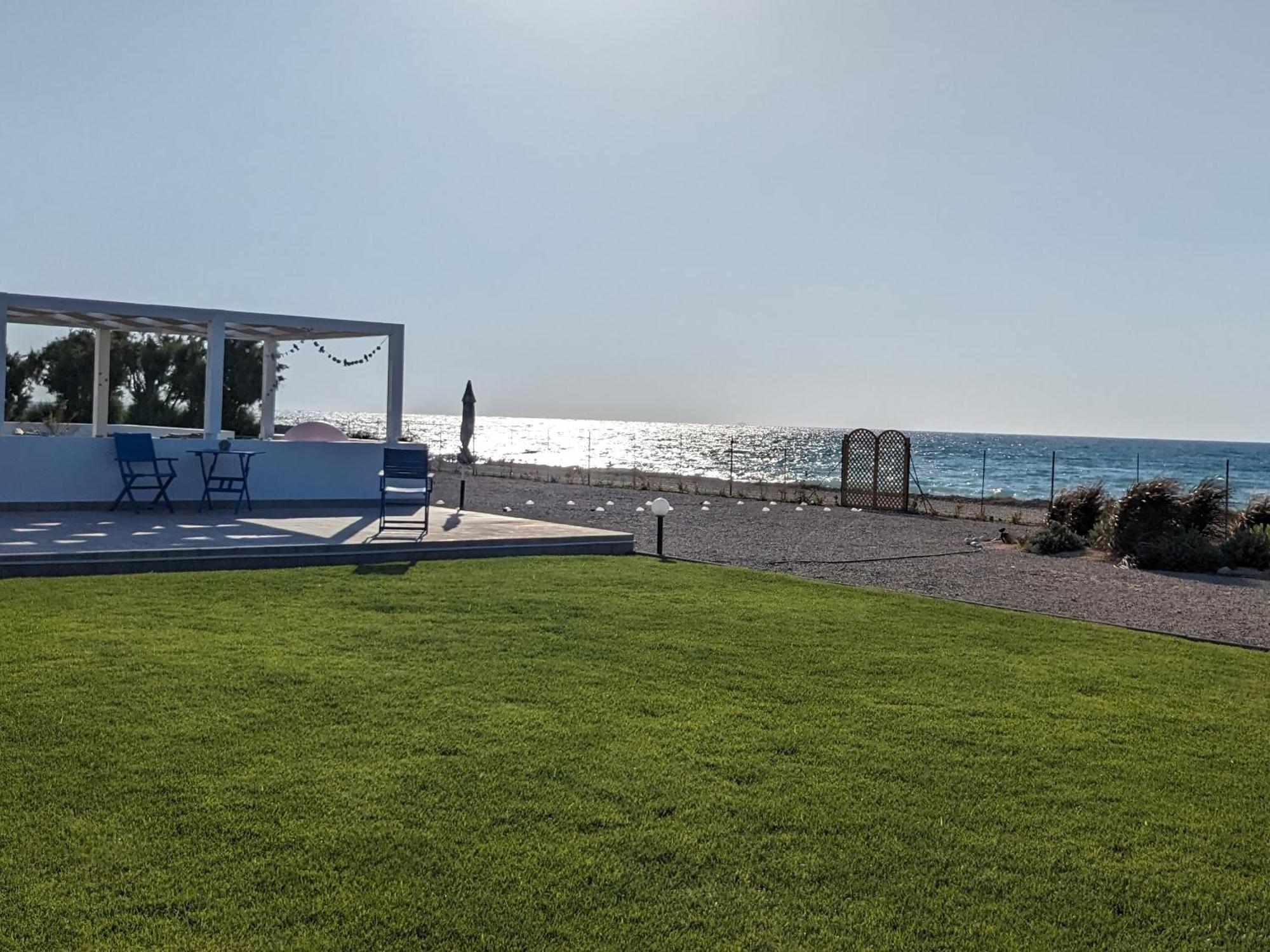 Lambou Beach Sunset Soroni Exteriér fotografie